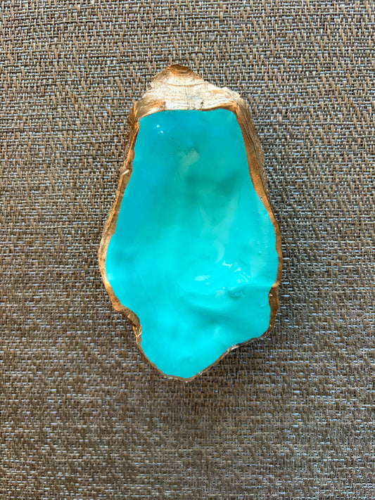 oyster shell ring/trinket dish hand painted in a bright, turquoise color 